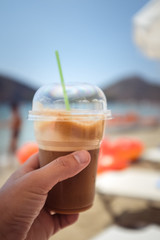Frappe in der Hand