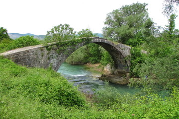 Fototapeta na wymiar Stone Bridge on Bregava River in Bosnia and Herzegovina