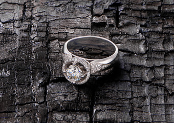 Diamond ring on burnt background