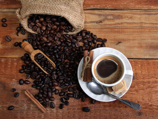 Irish coffee in glass on wooden table. 