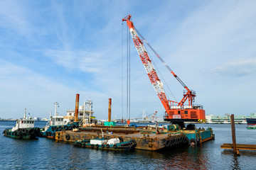 Ship dock with crane at construction site
