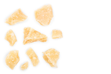 Parmesan cheese pieces isolated on white background with copy space for your text. Closeup. Top view. Flat lay