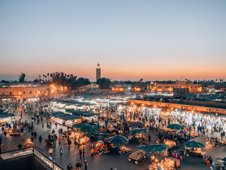 Djemaa el Fna - a famous market place in Marrakech, Morocco - obrazy, fototapety, plakaty