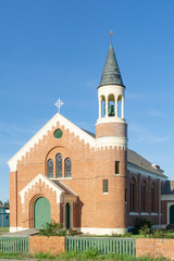 Fototapeta na wymiar Red brick church in Ranfurly