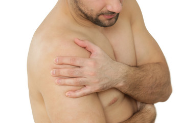 Naklejka premium Studio shot of young man with shoulder pain