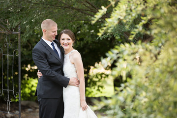 Young groom looking at bride 