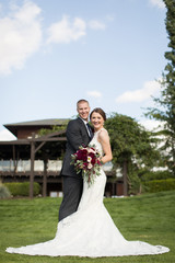 Young beautiful bride and groom on wedding day