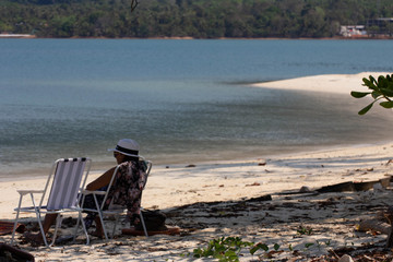 On a tropical beach in Thailand