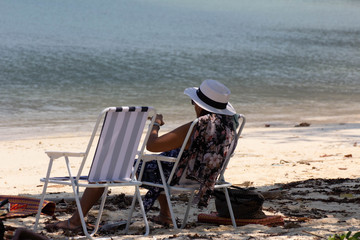 On a tropical beach in Thailand