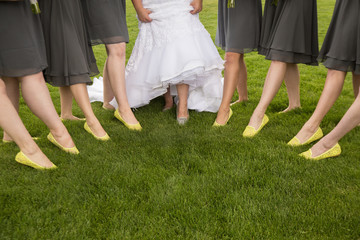 Bridesmaids wearing yellow flats