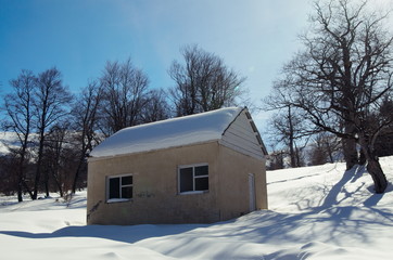 House in the snowy mountains