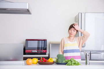 家事に疲れた女性