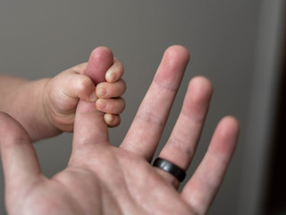 Baby Holding Finger