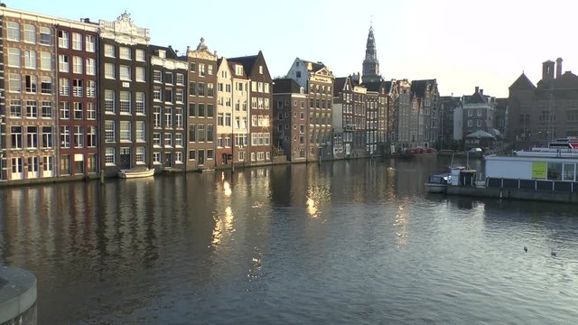 Amsterdam, Netherlands. Damrak at sunset.
