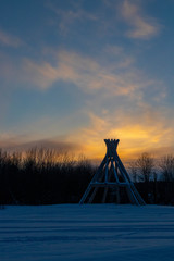 sunset over teepee