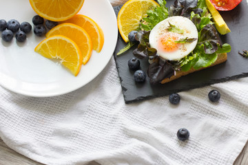 Breakfast - Sandwich with ham and tomatoes on plate