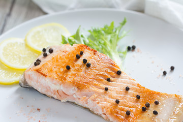 Grilled Salmon with lemon and herb.