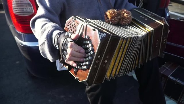 Old Man Playing Accordion.