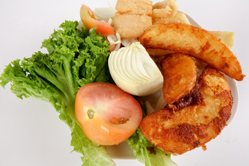 Fish and Chips with vegatables isolated on white.