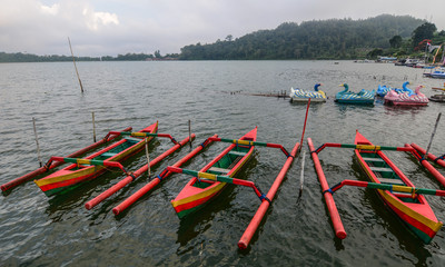 Traditional wooden boats on Lake Beratan
