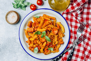 Pasta with sausage in tomato sauce, italian food