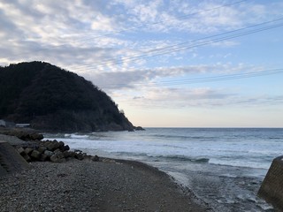 Fototapeta na wymiar Japan Hyougo Toyooka city Takeno seaside Yodonodoumon sea cave drone shot