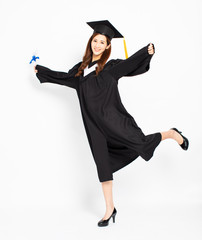smiling asian girl graduation with diploma