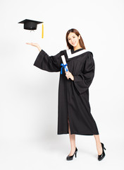 smiling asian girl graduation with diploma