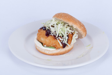  Fast food, delicious fish burger, beautifully laid out on a wooden background, for culinary design