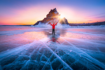Traveller man raise up hand freedom and enjoy view of beautiful landscape natural breaking ice in...
