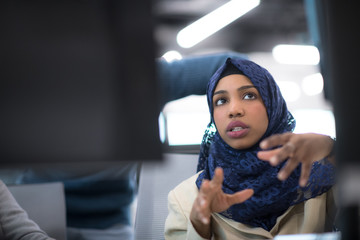 black muslim female software developer at work