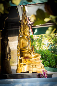 Golden antique buddha statue