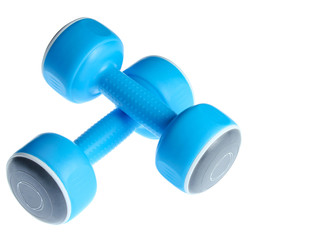 Two plastic blue dumbbells isolated on a white background. Sports concept.