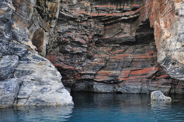 Icebergs, ocean, mountains. Near the coast of Greenland. Disco Bay.