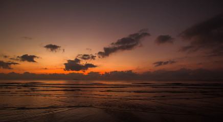 Fototapeta na wymiar Beautiful sunrise on the beach.