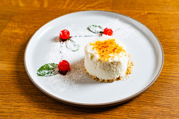 Raw vanilla bean and cherry cheesecake made with paleo ingredients.