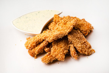 Fried chicken nuggets isolated on white background