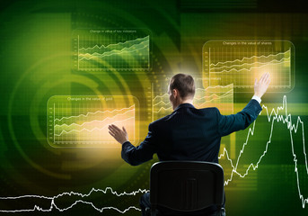 Businessman using media interface