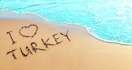 Turkey holidays concept. The inscription on the sand by the sea - I love Turkey
