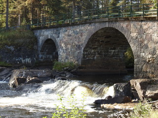 Fototapeta na wymiar Old Stone Bridge