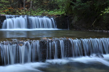 Source Vistula. Crystalline stream, clean water and waterfall