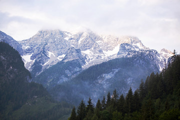 View of the snowy Alpine mountains in the evening