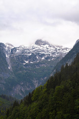 Fototapeta premium View of the snowy Alpine mountains in the evening