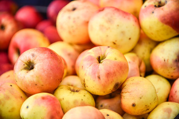Natural apples at marketplace.