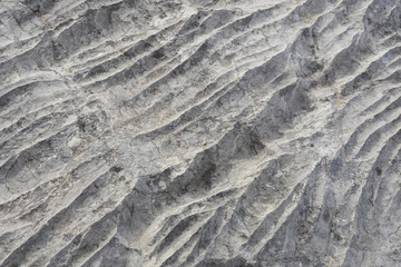 Rock formation in Sicevo gorge. Stone background, strange waves in the rock