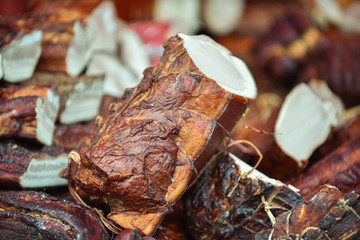 Street sale and tasting of exposed sausages, ham and bacon.