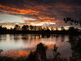 Naklejka premium Red River Dusk