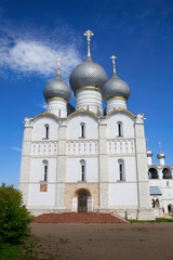 Fototapeta na wymiar On a sunny summer day view of the Assumption Cathedral in the Rostov Kremlin. Gold ring of Russia