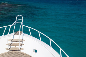 Obraz premium Partial view of a ship's front with stairs and railing