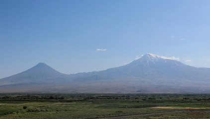 Naklejka premium Mount Ararat from distance with green fields